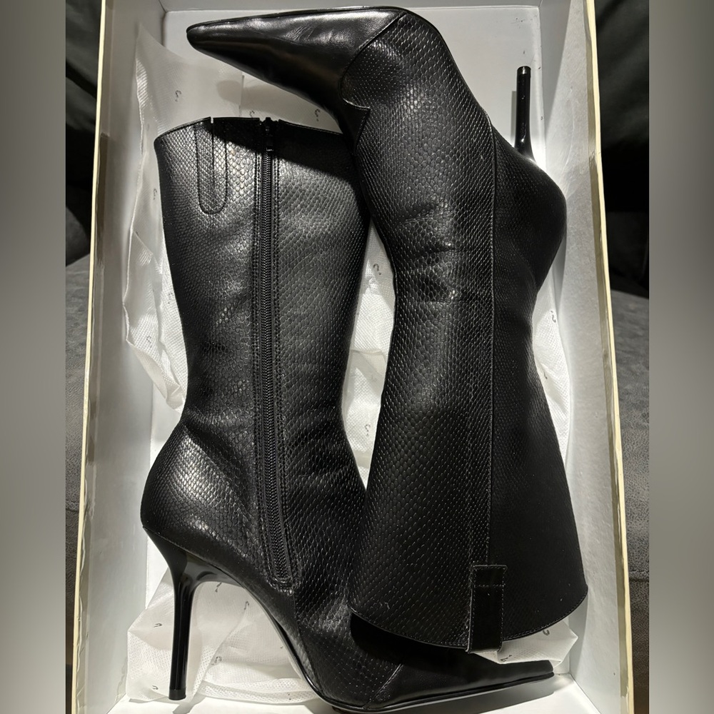 Brand new in box black snakeskin guess stiletto boots; size 7.5